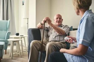 senior patient with caregiver