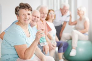 Group of older adults drinking water