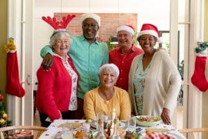 Joyful group of seniors celebrating Xmas.